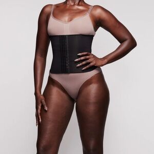 Skims waist trainer in medium. Brand new